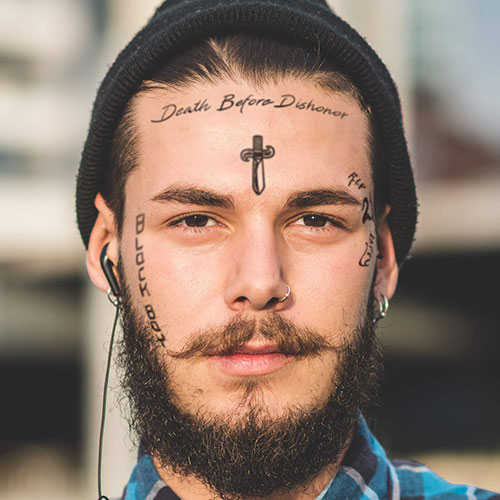 Small Cross Face Tattoo