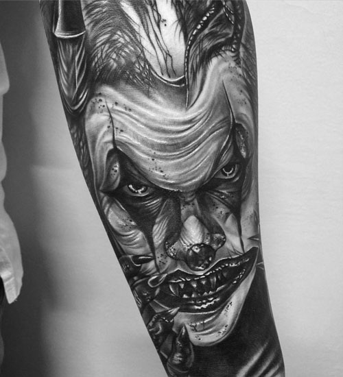 Badass Evil Joker Forearm Tattoo Designs