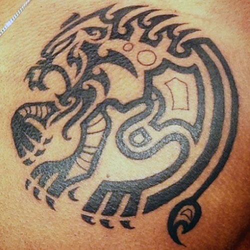 Creative Tribal Lion Tattoo on Chest