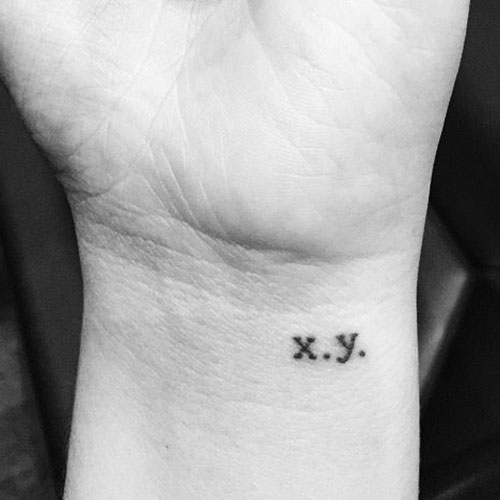 Small Initial Tattoo on Wrist